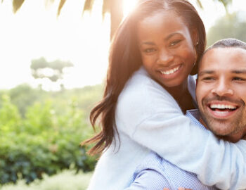 Portrait Of Loving African American Couple In Countryside